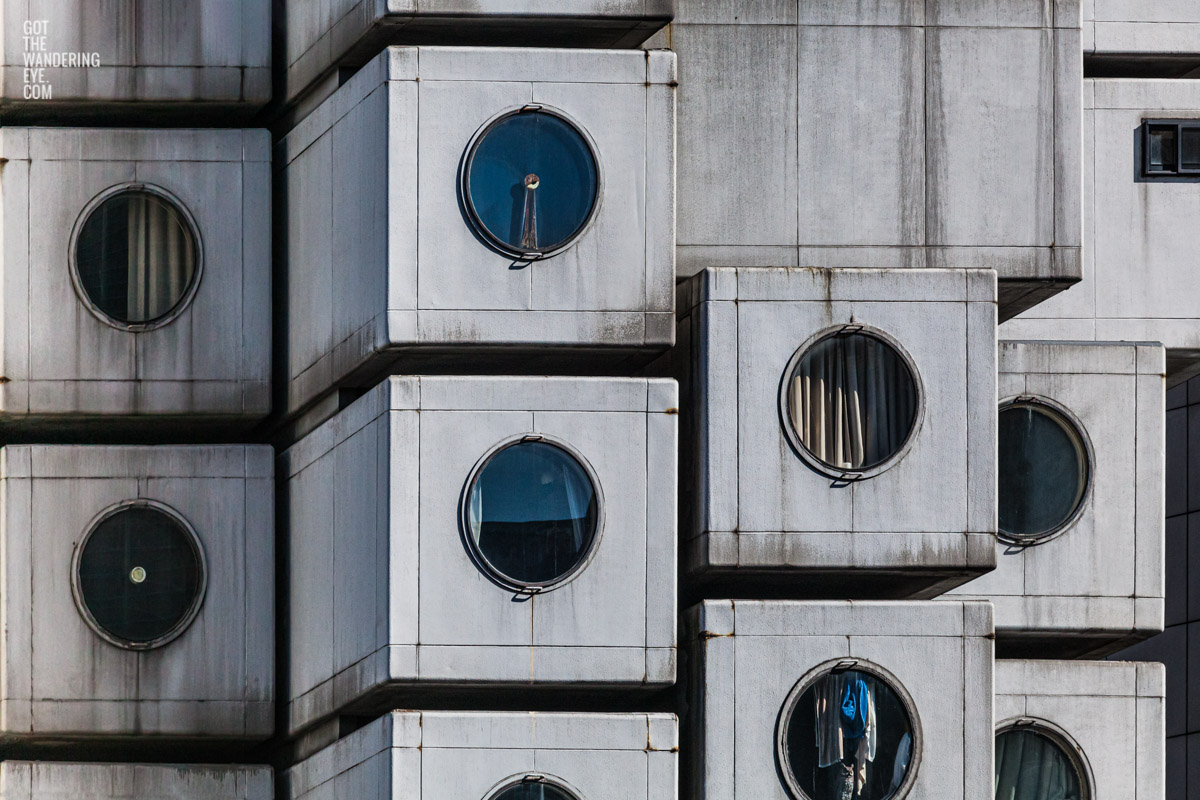 Urban architecture, close up of the capsules of the Nakagin Capsule Tower in Tokyo, Japan. Tokyo Cube House