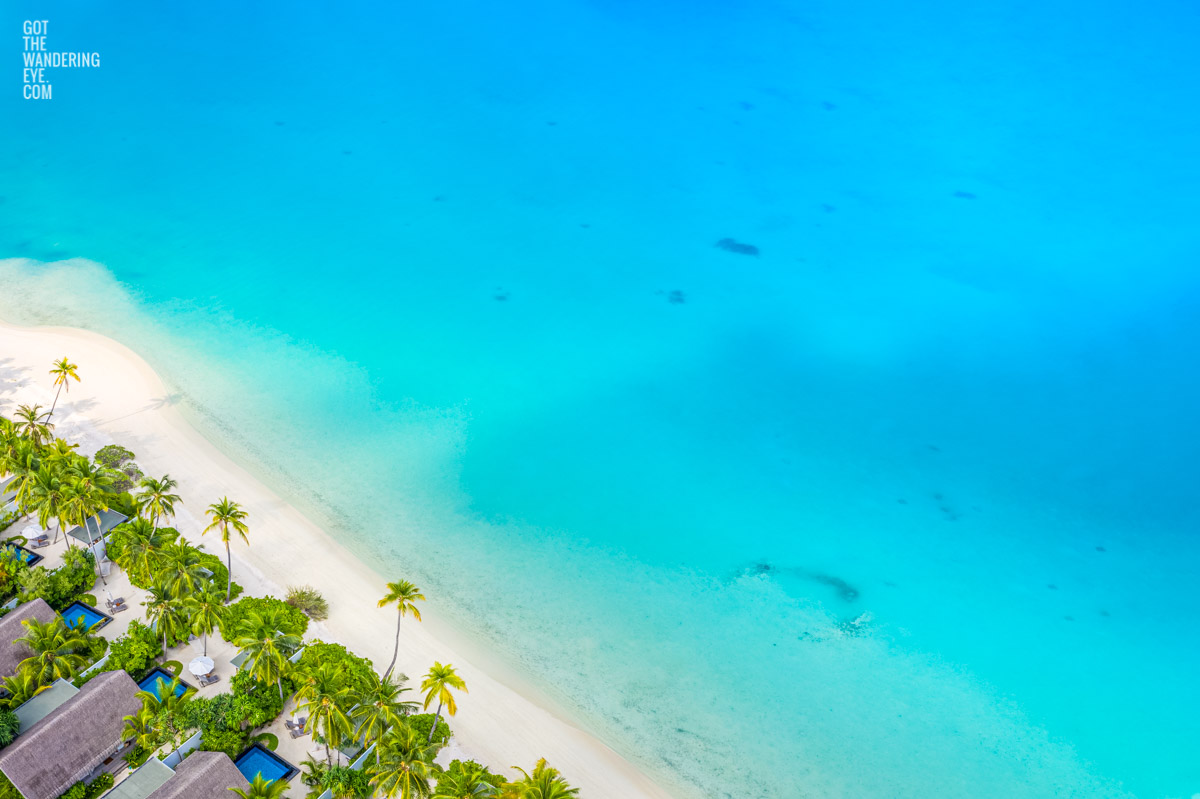Aerial oceanscape above maldivian beach and water beach villas