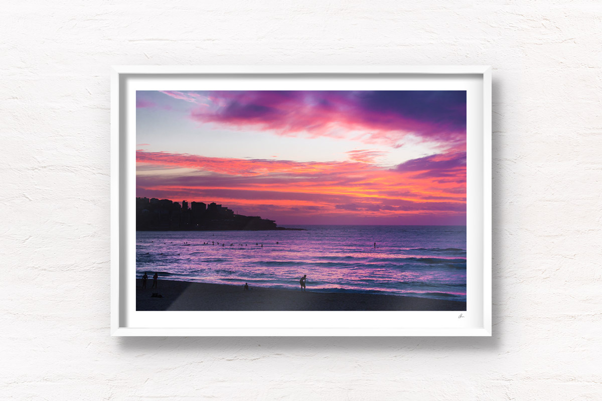 Spectacular pink sky sunrise looking towards Ben Buckler, Bondi Beach