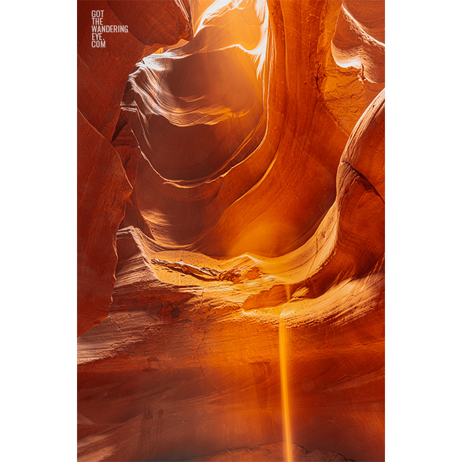 Sand falling from the sandstone slot canyon in Antelope Canyon, Arizona