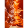 Looking through the swirling sandstone textures of the slot canyon at upper Antelope Canyon, Arizona.