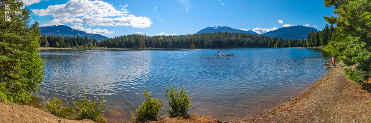 Panoramic view of gorgeous lake with mountains in Whistler, Canada