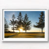 A couple enjoying a beautiful sunrise and morning walk along Coogee Beach