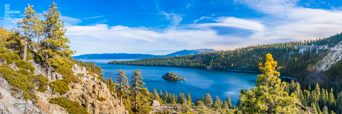 Panoramic view of mountains and Emerald Bay's stunning blue waters in Lake Tahoe, California