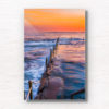 Long exposure photo of Wylies Baths ocean rockpool during sunrise at Coogee