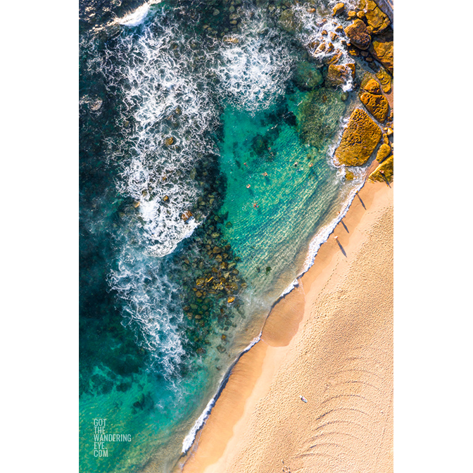 Aerial photograph of swimmers enjoying the Bogey Hole, Bronte Beach