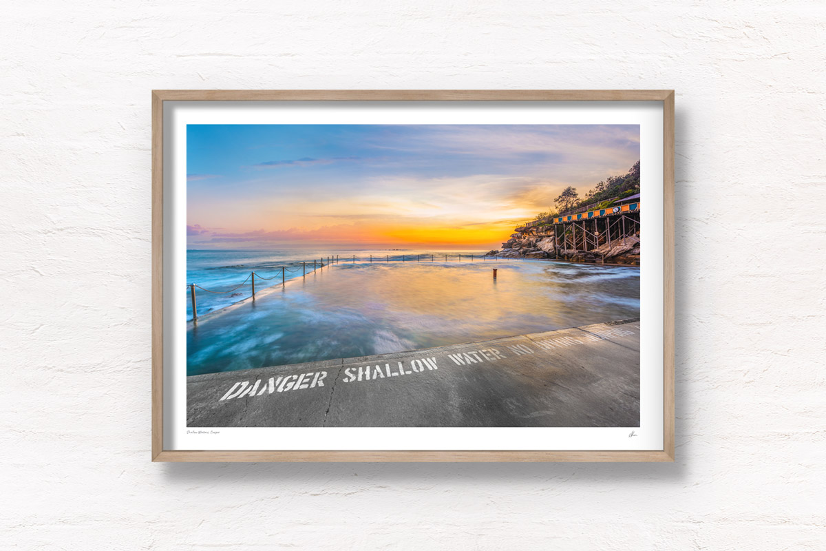 Long exposure of the sun rising over the iconic ocean pool, Wylies Baths in Coogee