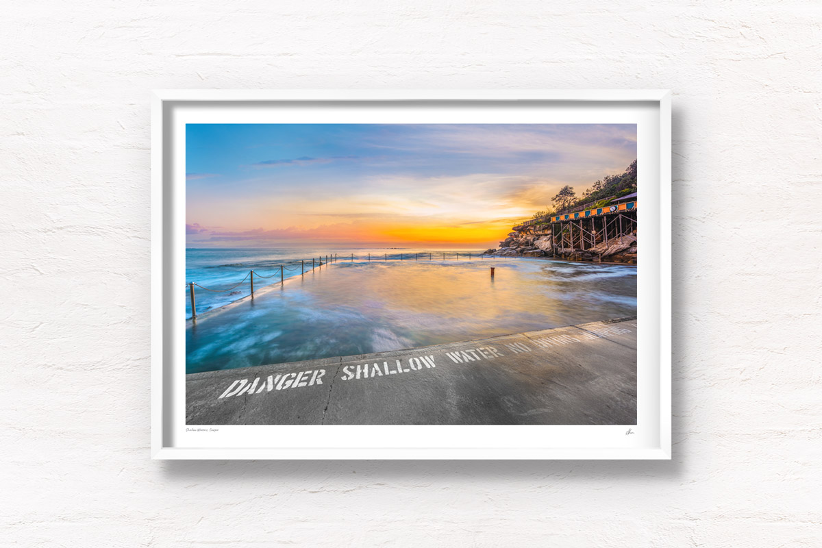 Long exposure of the sun rising over the iconic ocean pool, Wylies Baths in Coogee