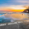 Long exposure of the sun rising over the iconic ocean pool, Wylies Baths in Coogee.
