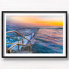 Long exposure photo of Wylies Baths ocean rockpool during sunrise at Coogee