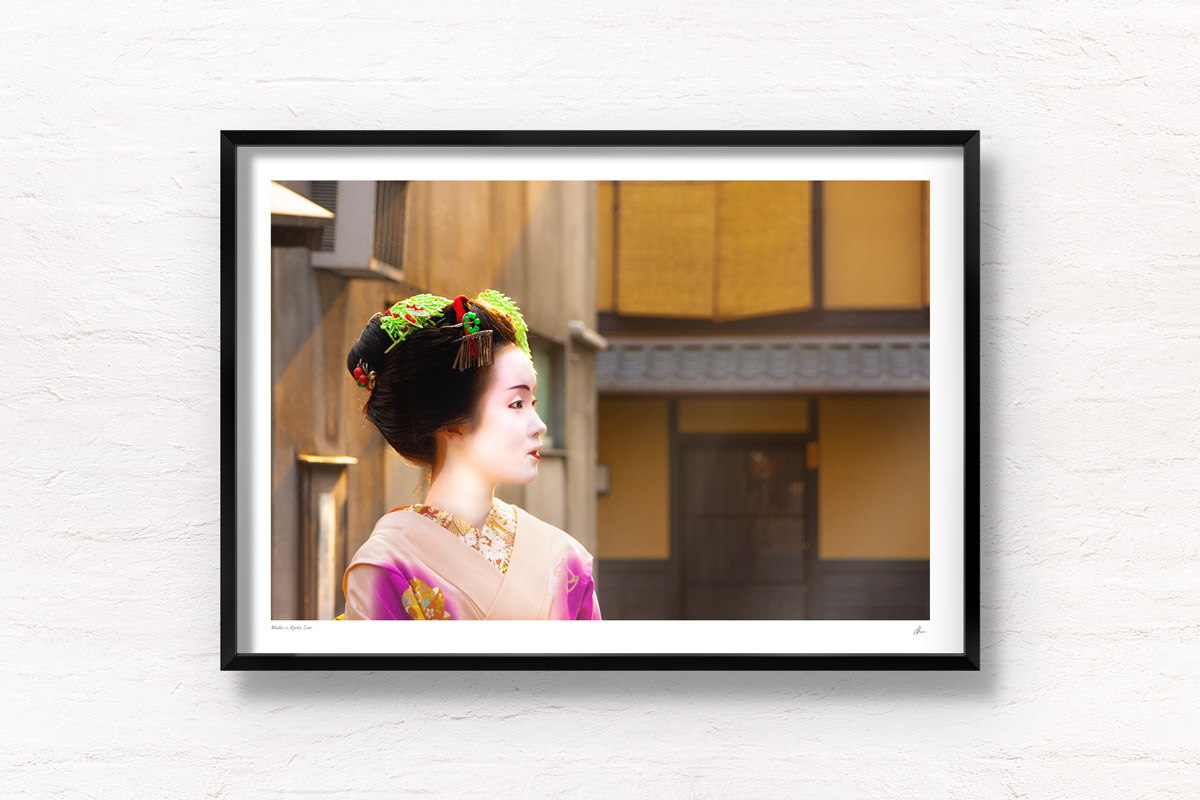 Portrait photo of a Maiko (apprentice Geisha) walking the streets of Gion, Kyoto Japan