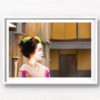 Portrait photo of a Maiko (apprentice Geisha) walking the streets of Gion, Kyoto Japan