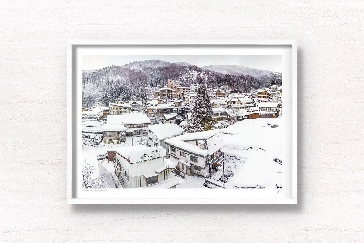 Snowy mountain village. Nozawa Onsen, Japan buried under snow.