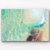 Aerial seascape of lone swimmer on Maroubra Beach