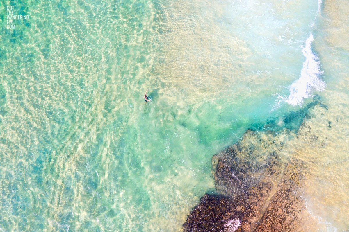 Aerial seascape of lone swimmer on Maroubra Beach