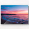 Aerial seascape of a gorgeous pink sky sunrise over Ben Buckler Bondi Beach