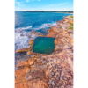 Aerial seascape above swimmers in Mahon Pool, Maroubra on Summers Day.
