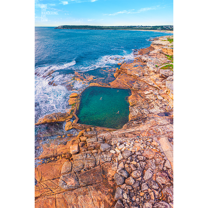 Aerial seascape above swimmers in Mahon Pool, Maroubra on Summers Day.