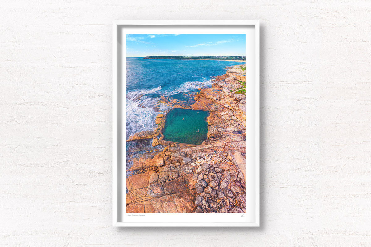 Aerial seascape above swimmers in Mahon Pool, Maroubra on Summers Day.