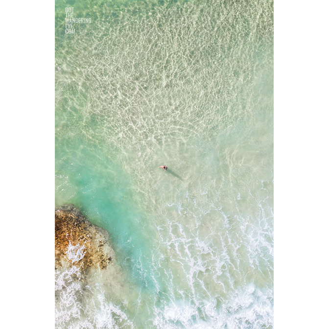 Aerial seascape above crystal clear waters of Maroubra Beach