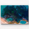 Aerial seascape above the blue waters of Bronte Beach Rockpool.