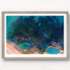 Aerial seascape above the blue waters of Bronte Beach Rockpool.