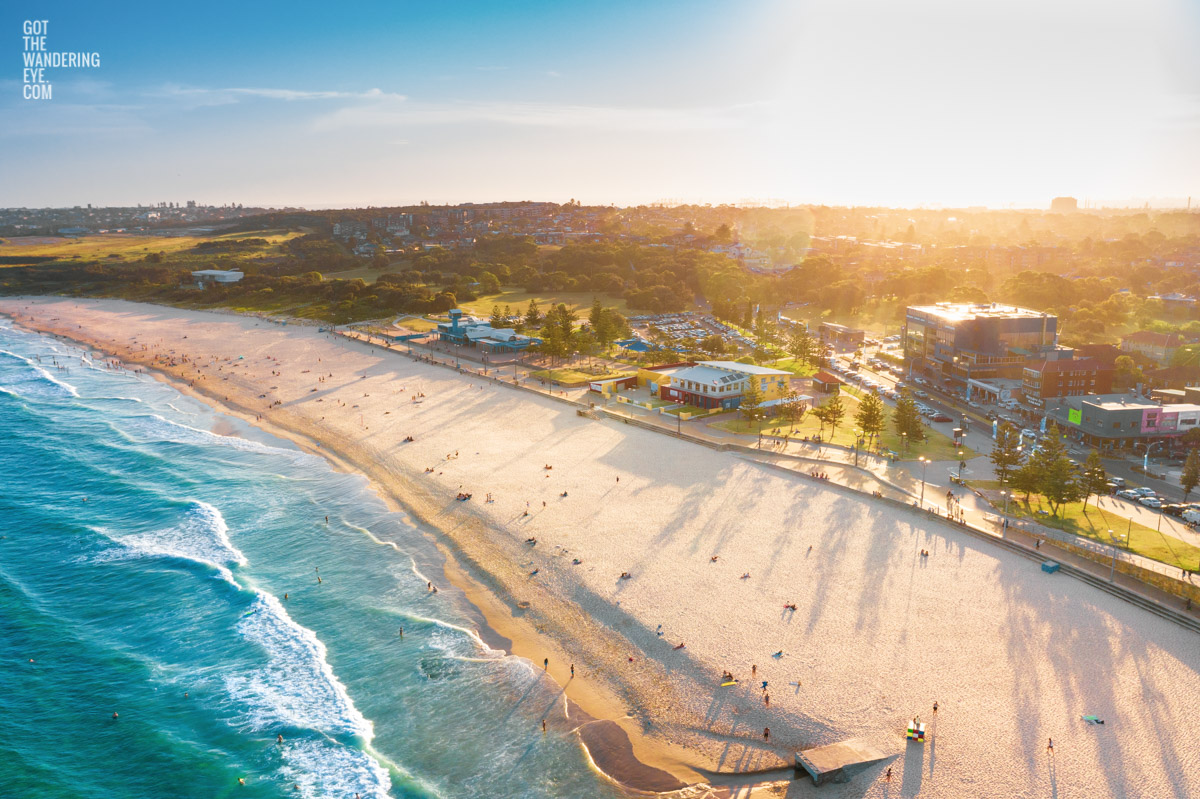 Aerial shot of a gorgeous golden sunset creating long soft shadows over Maroubra Beach, Sydney