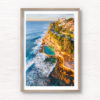 Aerial seascape of Bronte Rockpool bathed in a warm glow from the sunrise during Winter.