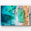 Aerial oceanscape above crystal clear waters of South Cronulla Beach Rockpool