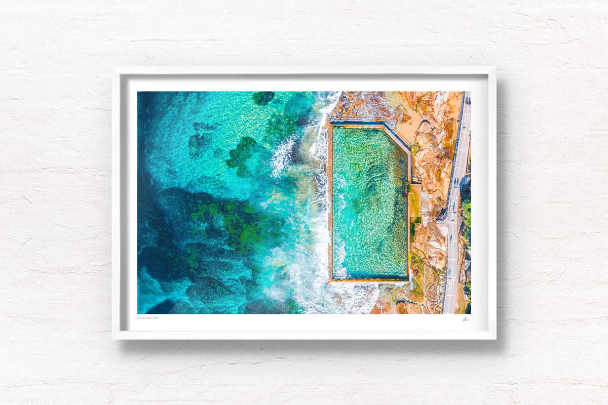 Aerial oceanscape above crystal clear waters of South Cronulla Beach Rockpool