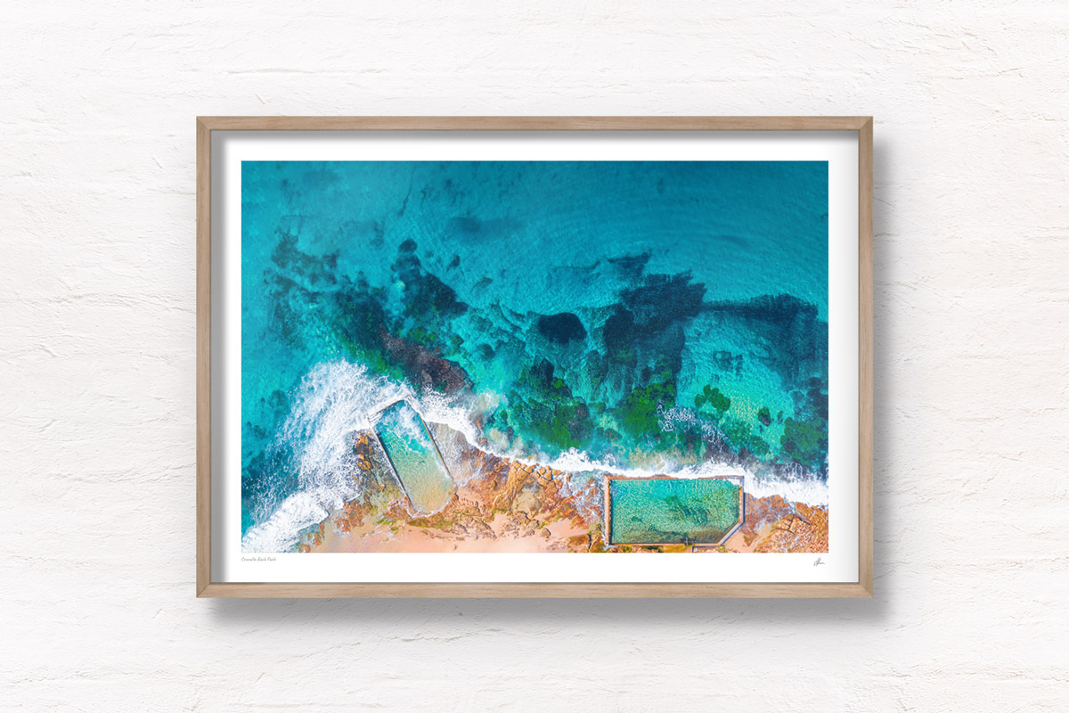 Aerial oceanscape above crystal clear waters of Cronulla Beach Rockpools