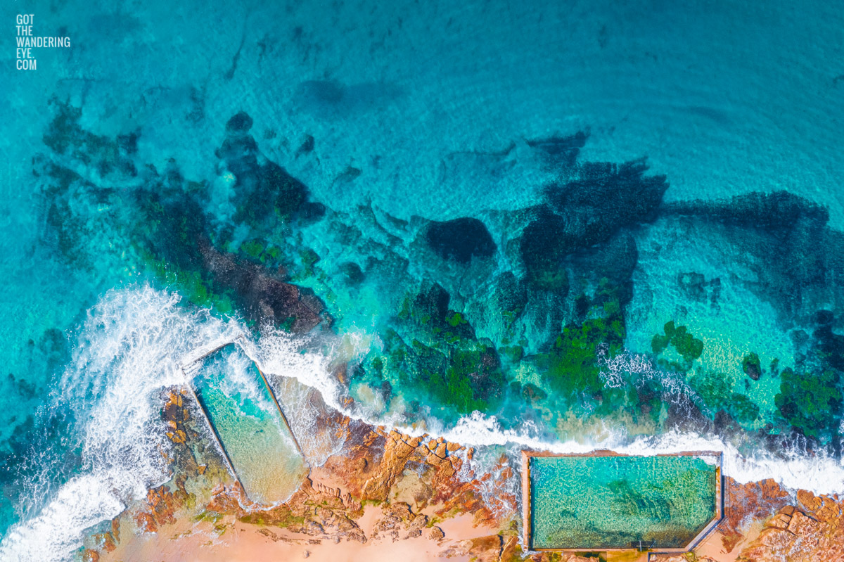 Aerial oceanscape above crystal clear waters of Cronulla Beach Rockpools