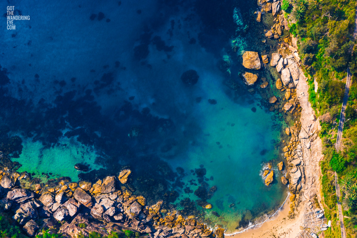 Aerial seascape above the gorgeous turquoise ocean waters of Gordons bay