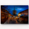 Woman walking in kimonos under the beautiful moonlight and lit lanterns in the Higashiyama District at Yasaka Pagoda, Kyoto, Japan