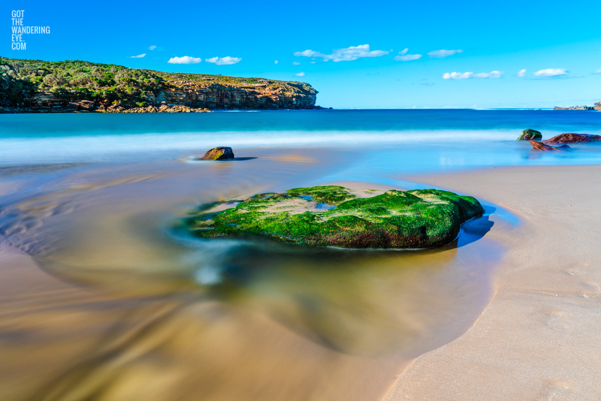 Gorgeous long exposure of silky waters of Wattamolla Beach in the Royal National Park