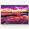 Long exposure of a gorgeous pink sky sunset, creating a silhouette over the Sydney skyline, taken from Milk Beach Vaucluse.