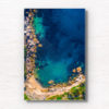 Aerial seascape above the gorgeous turquoise ocean waters of Gordons bay