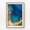 Aerial seascape above the gorgeous turquoise ocean waters of Gordons bay