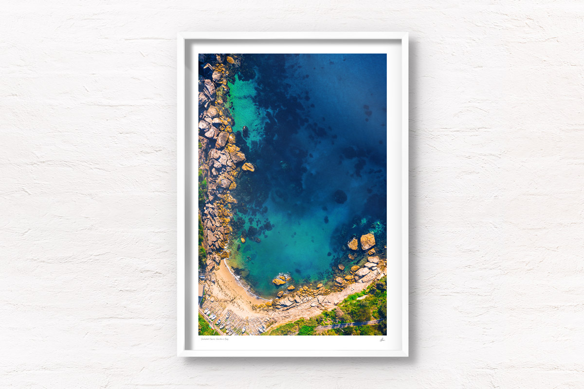 Aerial seascape above the gorgeous turquoise ocean waters of Gordons bay