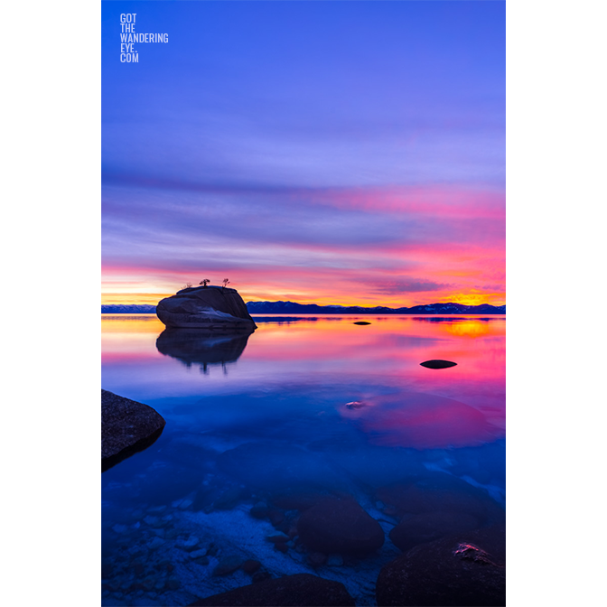 Long exposure of a beautiful pink and purple sky sunset at Bonsai Rock, Lake Tahoe