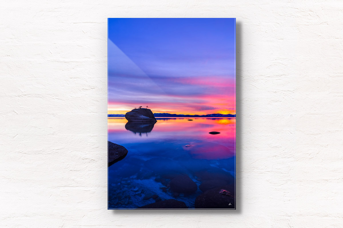 Long exposure of a beautiful pink and purple sky sunset at Bonsai Rock, Lake Tahoe
