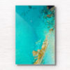 Aerial oceanscape above turquoise crystal clear waters of South Cronulla Beach.