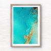 Aerial oceanscape above turquoise crystal clear waters of South Cronulla Beach.