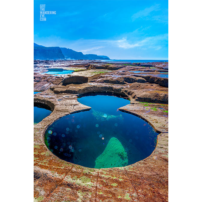 Sparkling ocean waters of Figure 8 Pool in the Royal National park on a bright and sunny day.