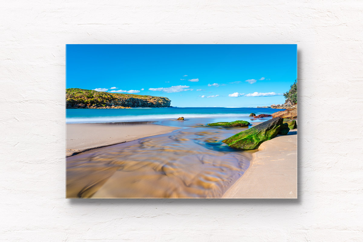 Framed fine art print of a beautiful long exposure photography of Wattamolla Beach, with waterfall stream flowing into beach, ocean. Royal National Park