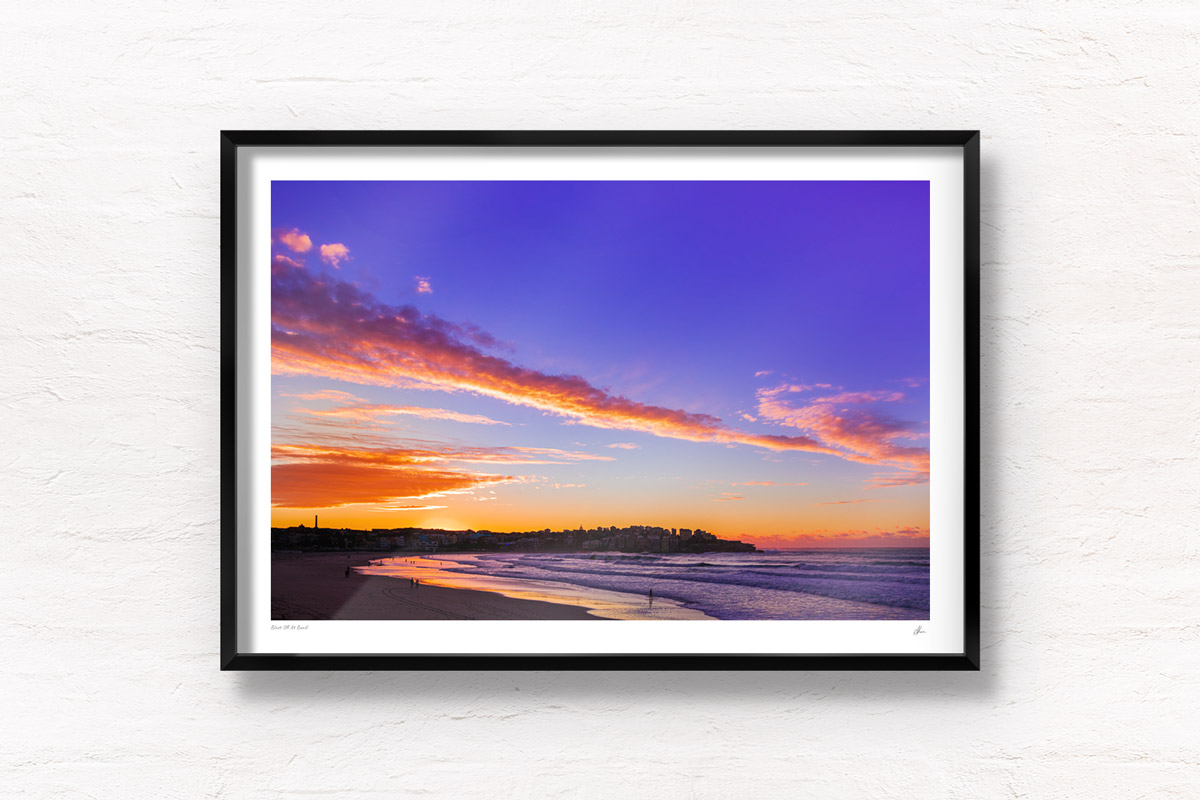 Buy fine art framed prints of a stunning beautiful, gorgeous sunrise and Bondi Beach. Early morning, best place in Sydney for sunrise. Pink, purple fiery sunrise