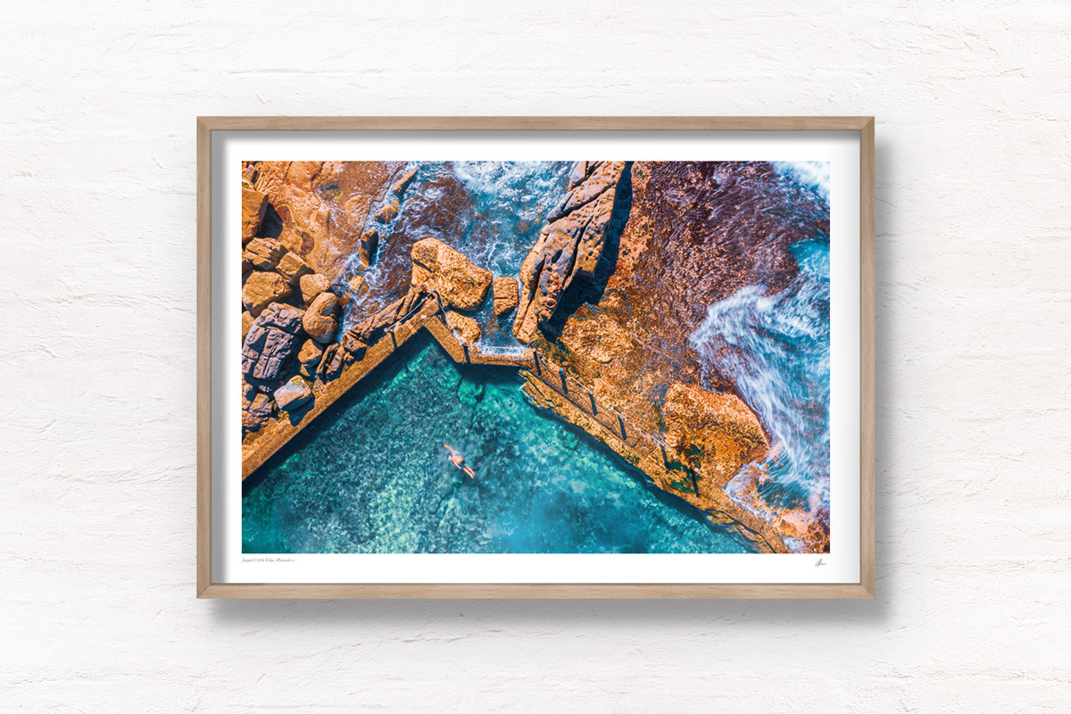 Fine art framed print of a man swimming in crystal clear ocean rockpool waters of Mahon Pool, Maroubra. Summer, swimming, beach, fun