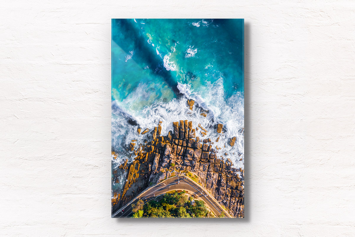 Fine art framed print of a aerial oceanscape above Marine Parade in Manly. Waves, ocean, beach rocks, walking path