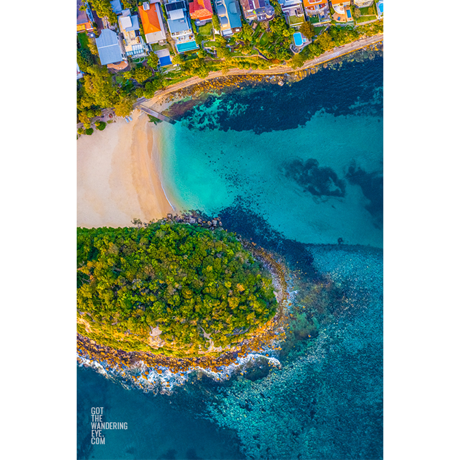 Aerial oceanscape above Cabbage tree Bay aquatic reserve, Shelly Beach Manly.