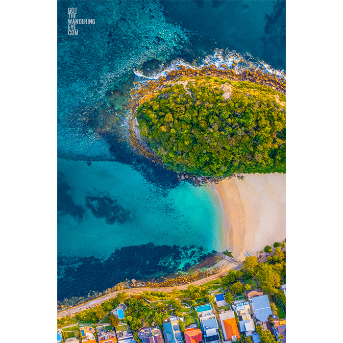 Aerial oceanscape above Cabbage tree Bay aquatic reserve, Shelly Beach, Manly. Ocean, beach, Sydney.